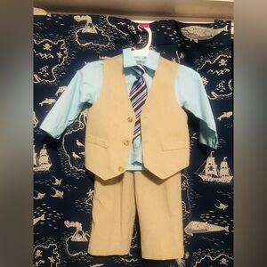 Suit Size 2T 
Pants, button down long sleeve Shirt, tie and vest